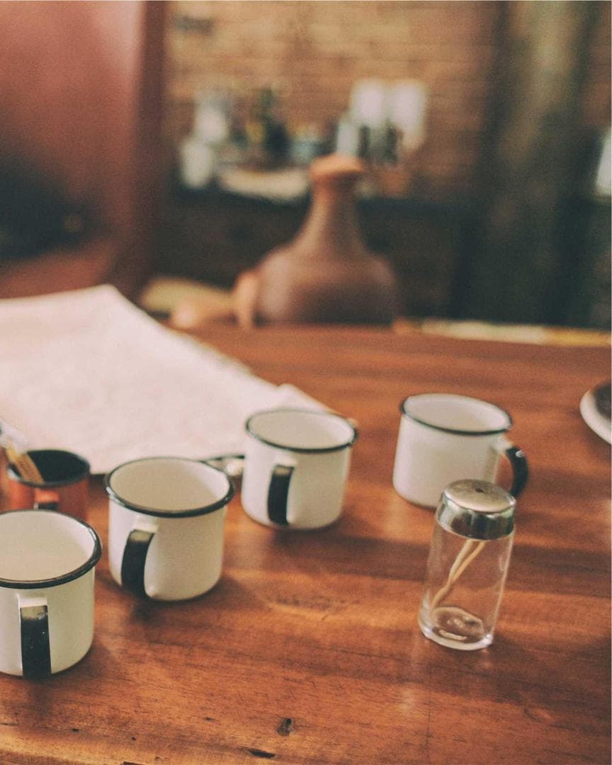 A cozy kitchen scene with warm wooden shelves